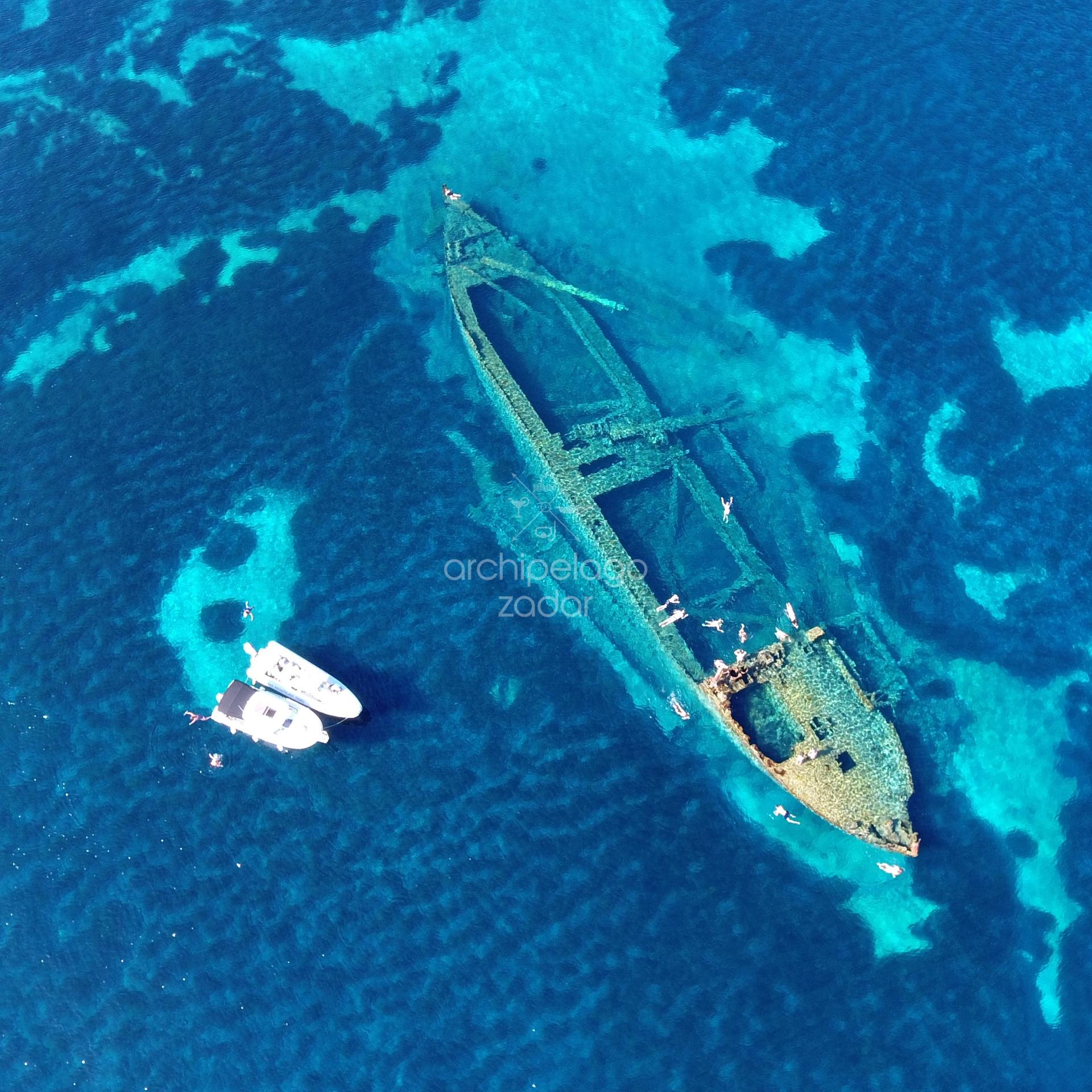 Sunken ship Michele dugi otok and boats