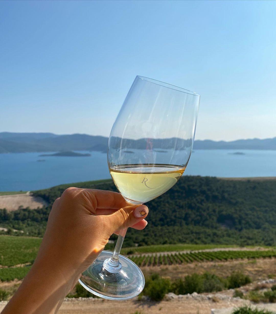 A raised glass to the beauty of the Croatian Adriatic sea