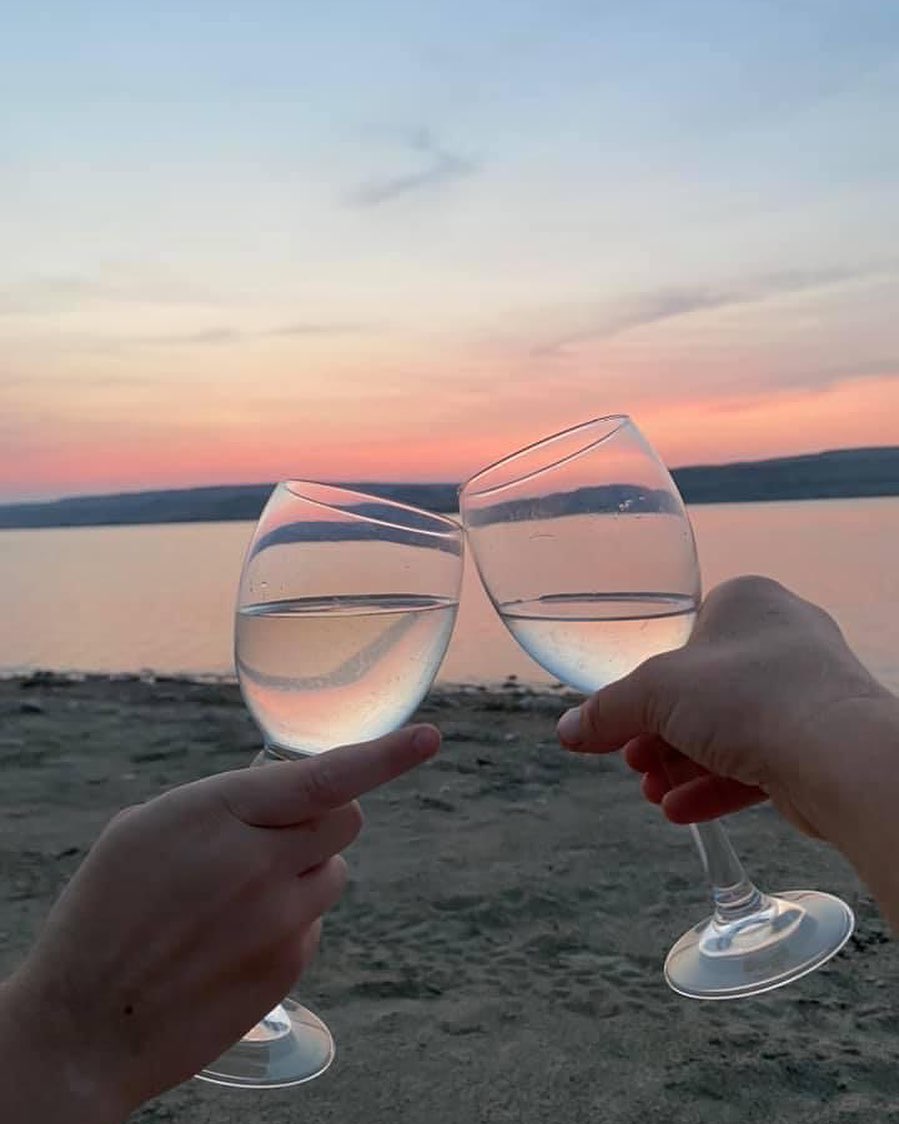 Toasting with incredible Croatian white wine on a beautiful beach
