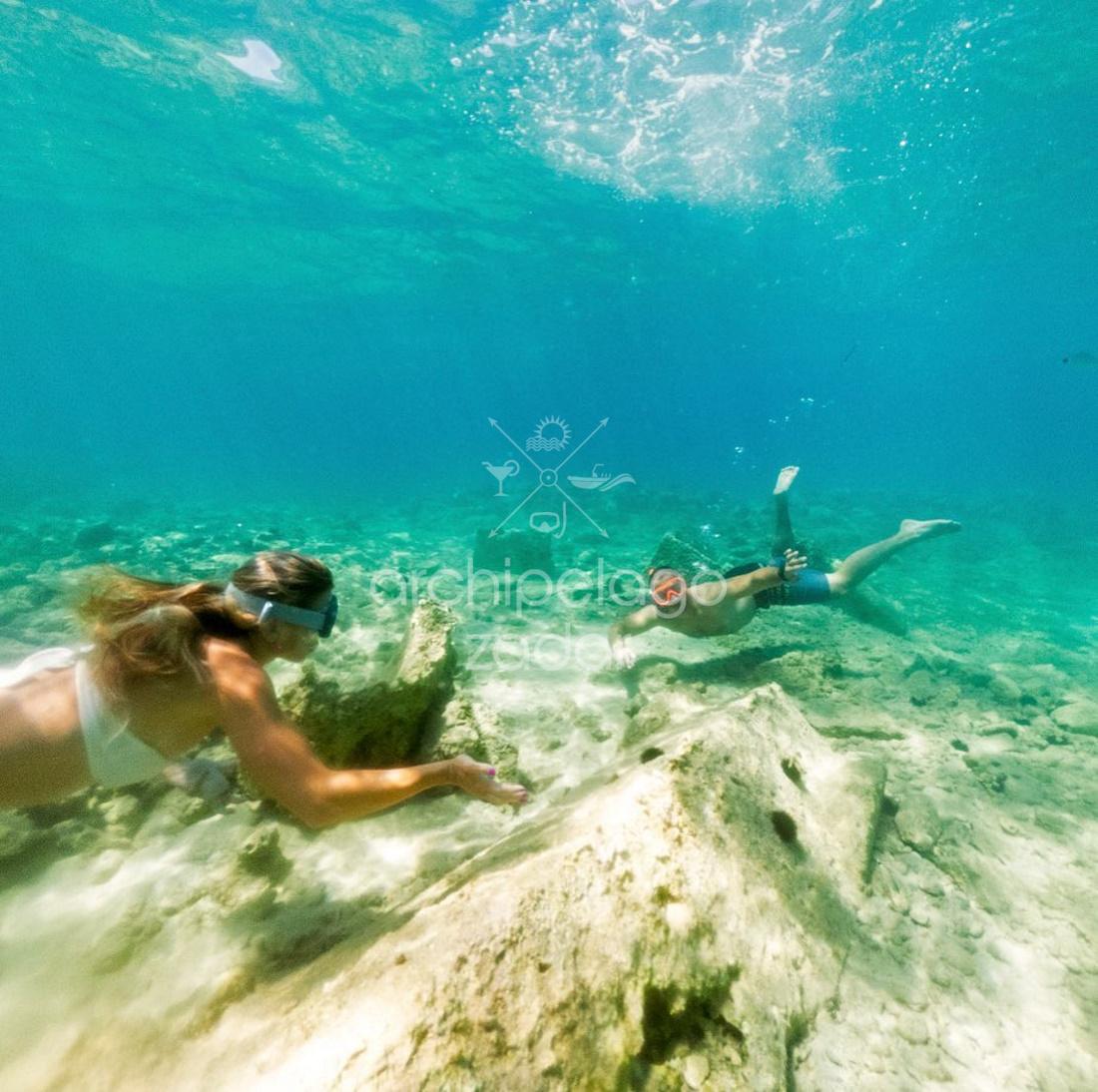 guy and girl snorkeling on silba island, best snorkeling spots in Zadar